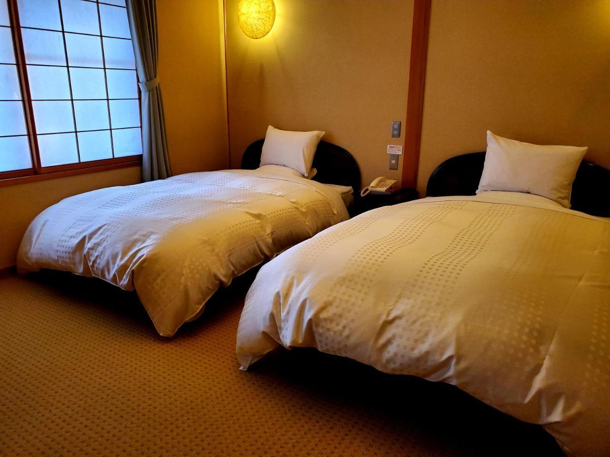 Ryotei Tanokura Hotell Yufu Eksteriør bilde